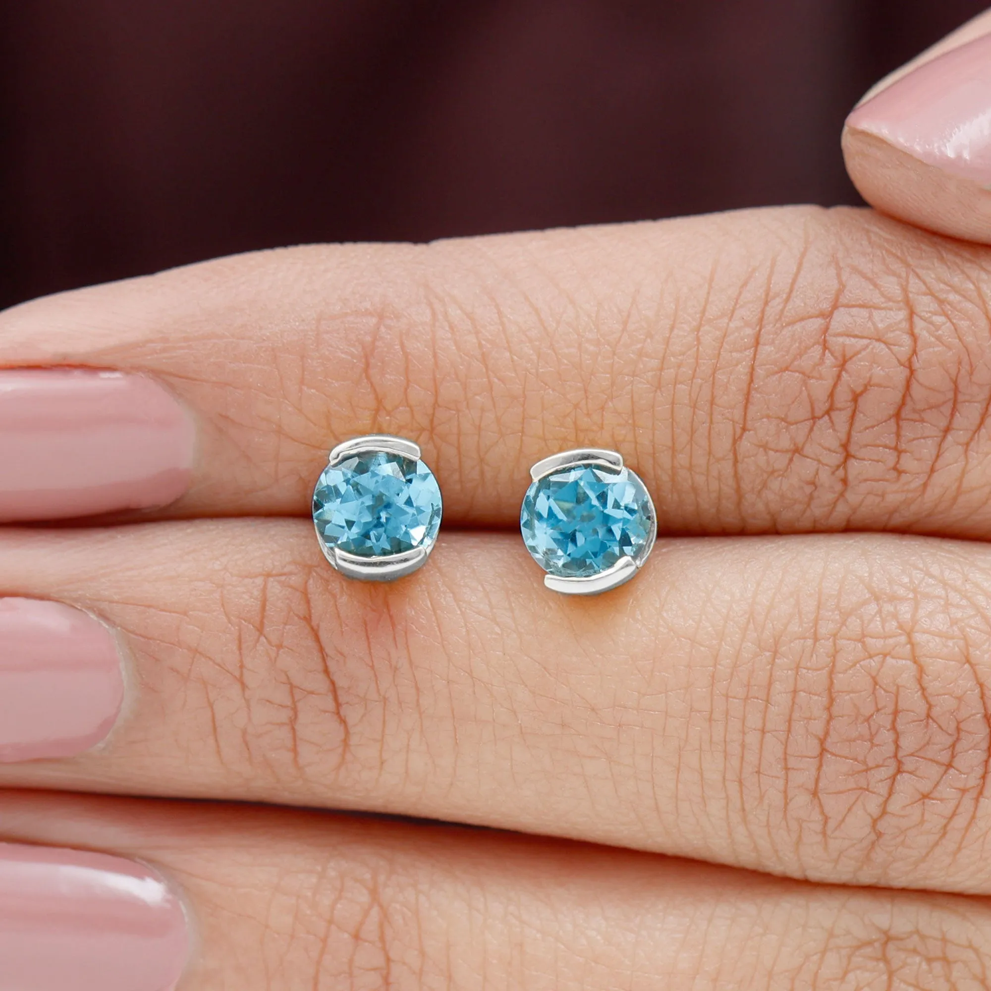 Swiss Blue Topaz Solitaire Stud Earrings in Half Bezel Setting