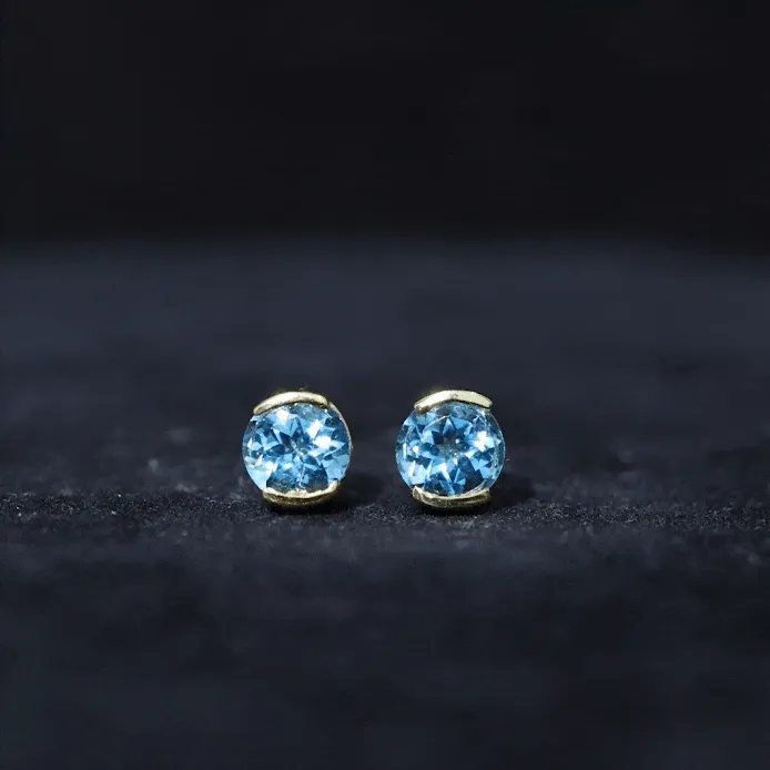 Swiss Blue Topaz Solitaire Stud Earrings in Half Bezel Setting