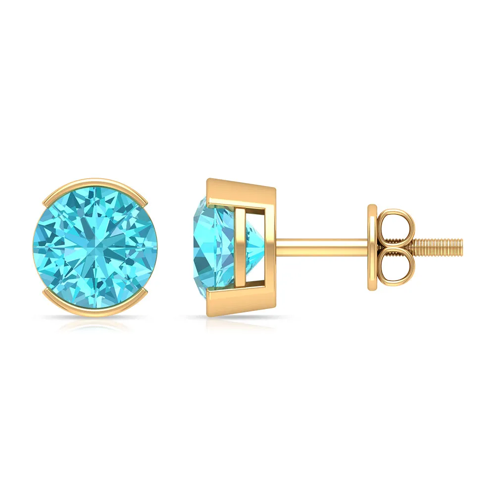 Swiss Blue Topaz Solitaire Stud Earrings in Half Bezel Setting