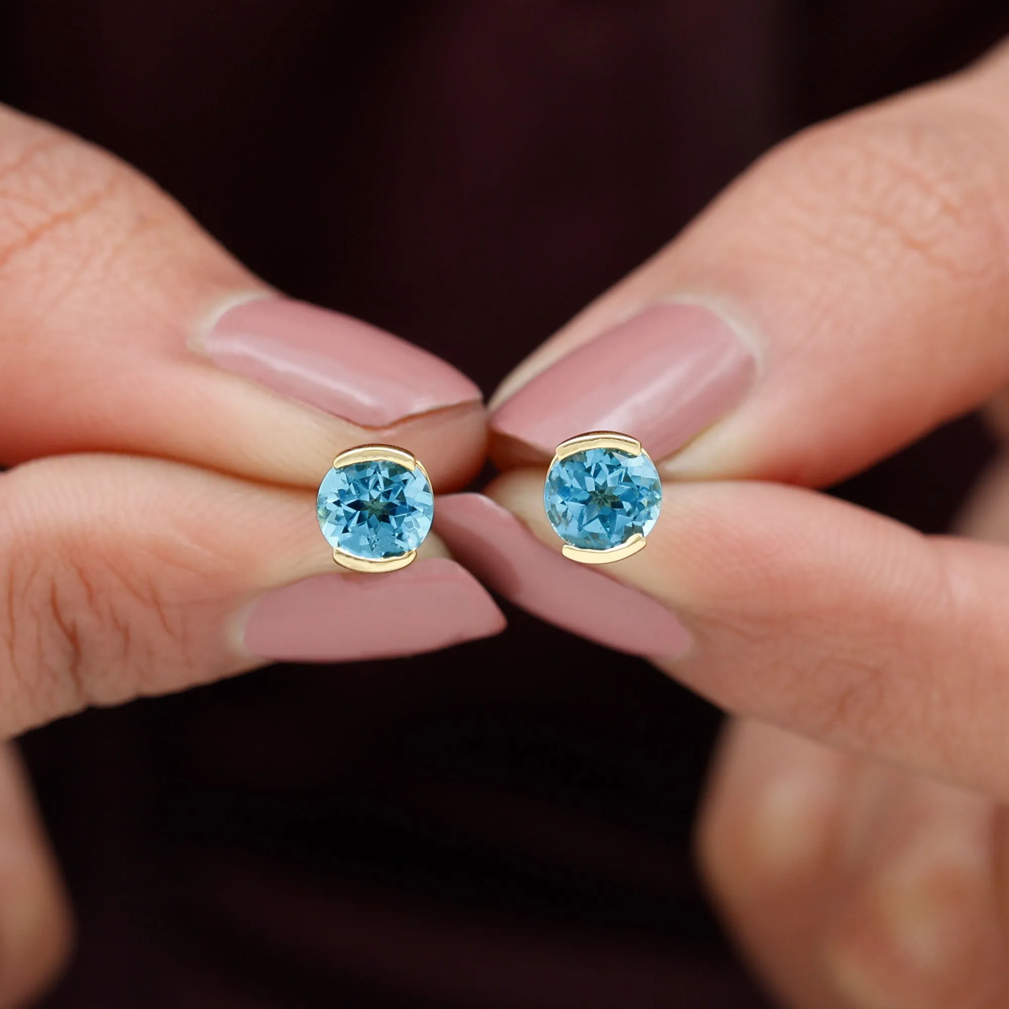 Swiss Blue Topaz Solitaire Stud Earrings in Half Bezel Setting